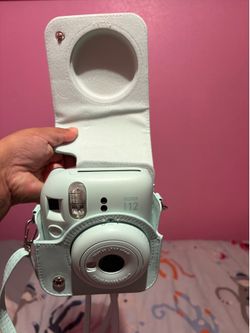 Green Instax mini camera
