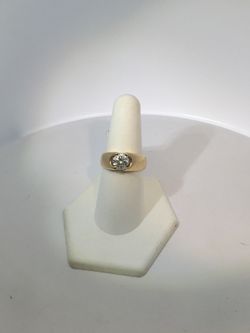 14K yellow gold with a 1.17 carat center Diamond ring