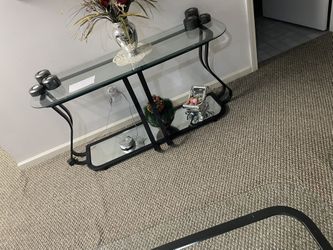 Four pieces, one coffee table, 2 end table one sofa table with all the decoration you see in the sofa table