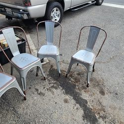 4 antique metal chairs