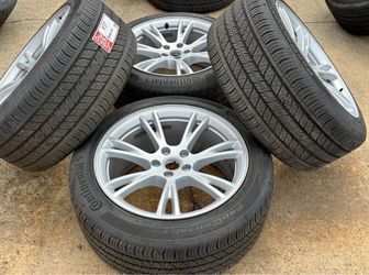 19” OEM TESLA MODEL Y GEMINI WHEELS SILVER WITH CONTINENTAL 90% TREAD