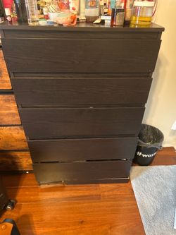 Dark brown wooden ikea dresser
