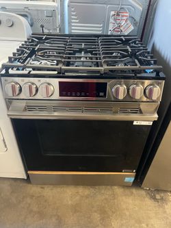 New LG 5 burner stove.