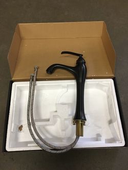 New in Box $25 oil rubbed bronze color single handle bathroom vessel faucet