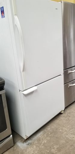 White Refrigerator with freezer on bottom
