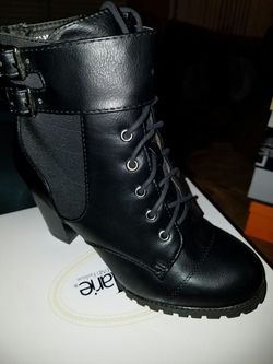 Black heeled army booties