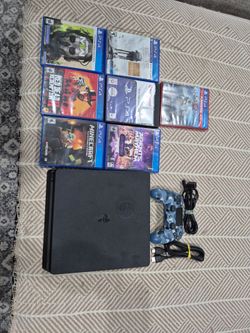 PS4 system with one controller and 7 games in good condition,  works perfectly