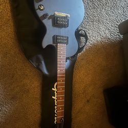 Epiphone Les Paul special model guitar bundle W/ amp and cord, strap, pick, and bag.  $250 OBO.