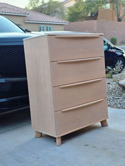 Mid Century Modern tall dresser beautifully constructed with solid maple Completely restored.