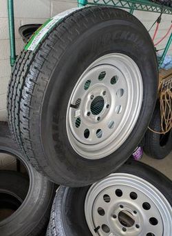 trailer tires new - ST205x75x15" on new, 5 on 4.5 lug rims