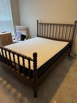 Queen size wooden frame bed