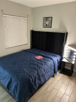 Queen headboard frame(black and silver)