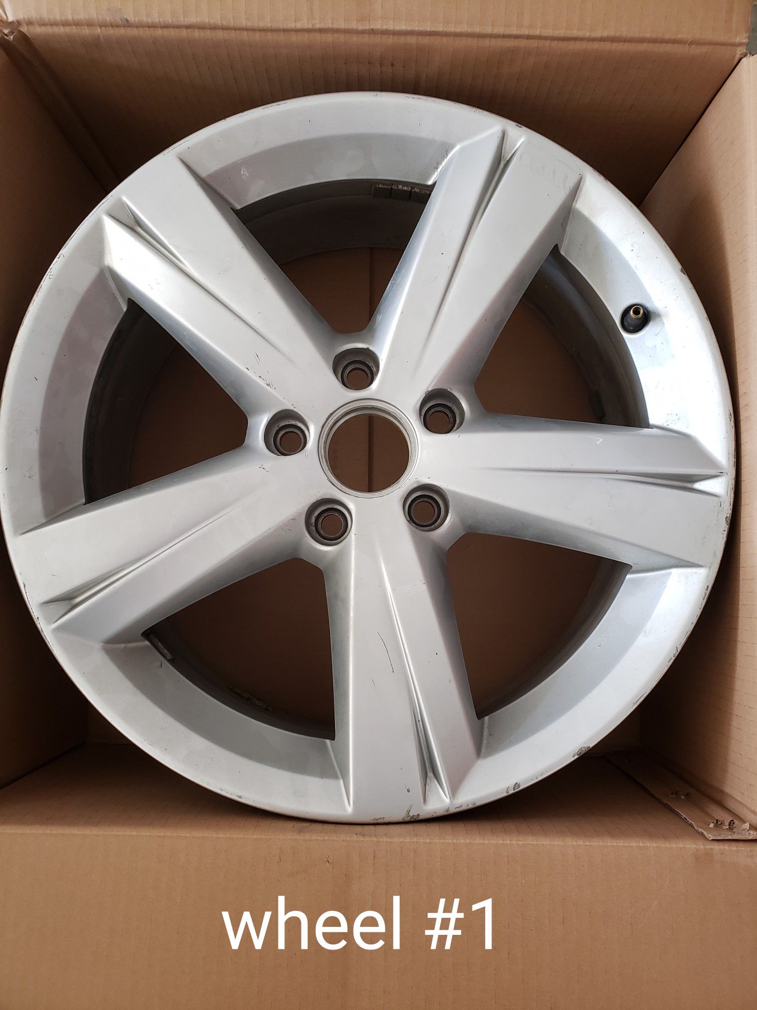 Two 17" 2014 Volkswagen Passat OEM wheels