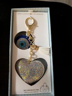 NEW "EVIL EYE" by Eye Candy, WITH BLING HEART