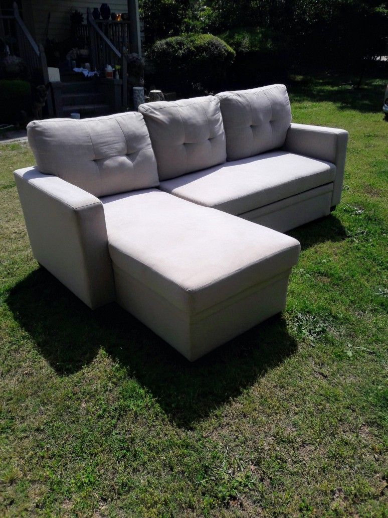 ** BEAUTIFUL SECTIONAL WITH STORAGE AND SLEEPER PULL-OUT