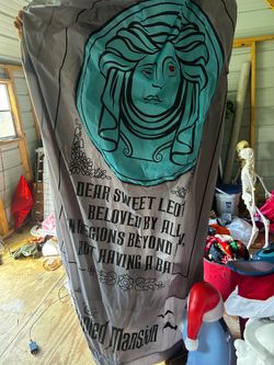 Inflatable haunted mansion gravestone