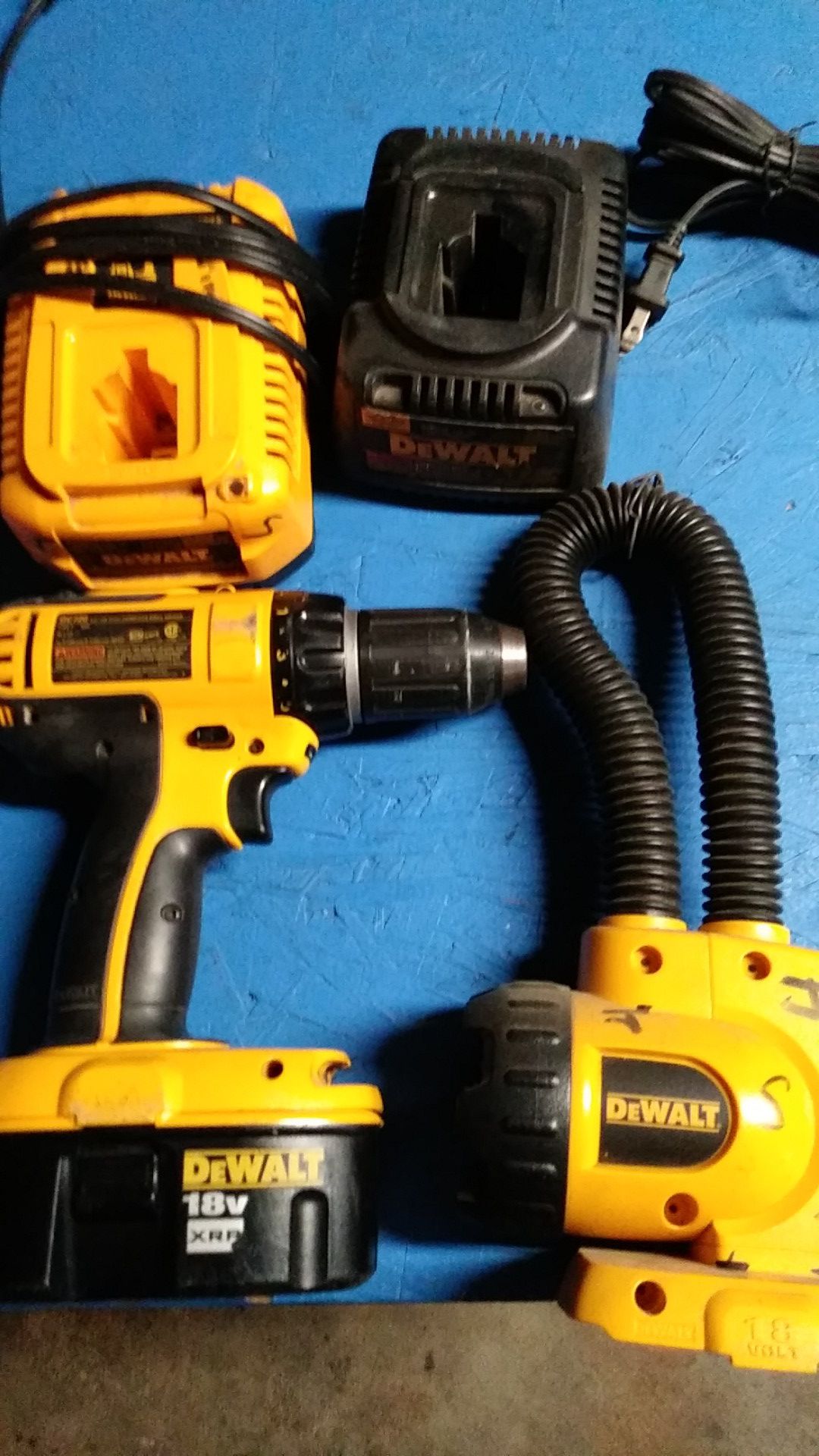 18 volt drill with battery and two Chargers and a flush light work good no shipping or delivery. Obo