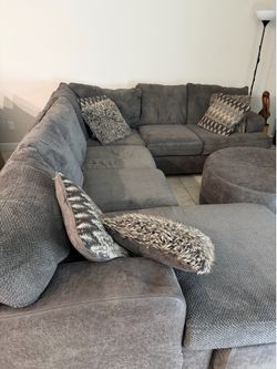 Sectional with chaise, ottoman and swivel chair