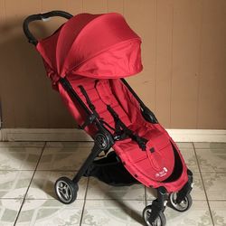 PRACTICALLY NEW BABY JOGGER STROLLER WITH CARRIER BAG!!!!!