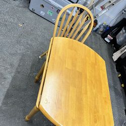 Drop leaf table and two chairs