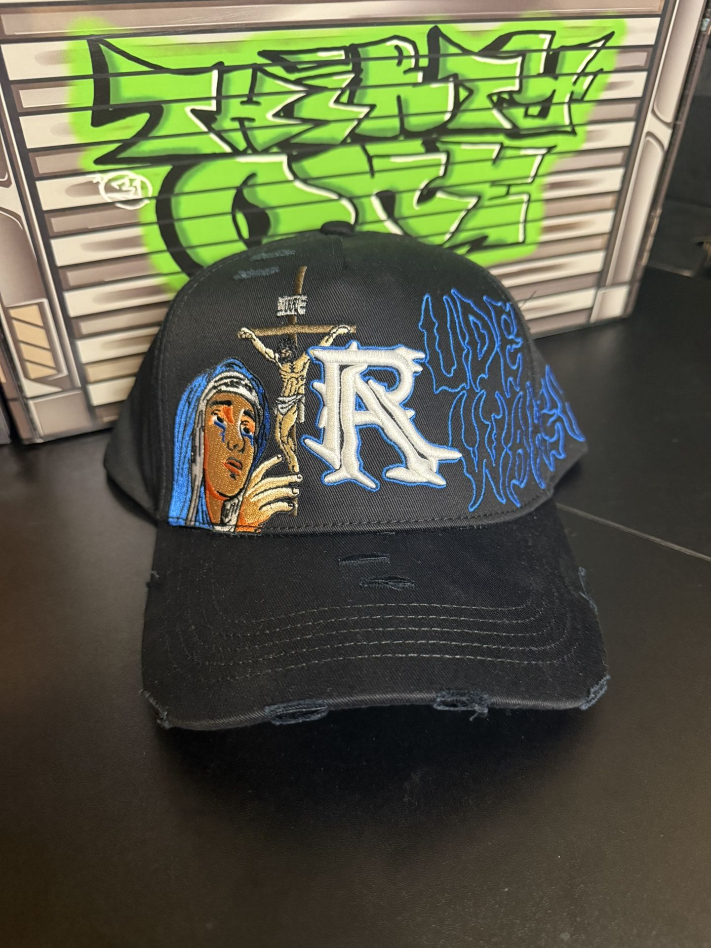 Rude Awakenings Hat Crucifixion  