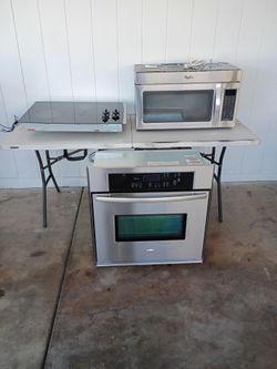 Whirlpool, Wall Oven And Electric Stove.
