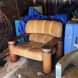 PACIFIC GREEN LEATHER AND WOOD ARMCHAIR WITH CERTIFICATION