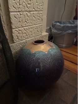 Gold and teal circular vases