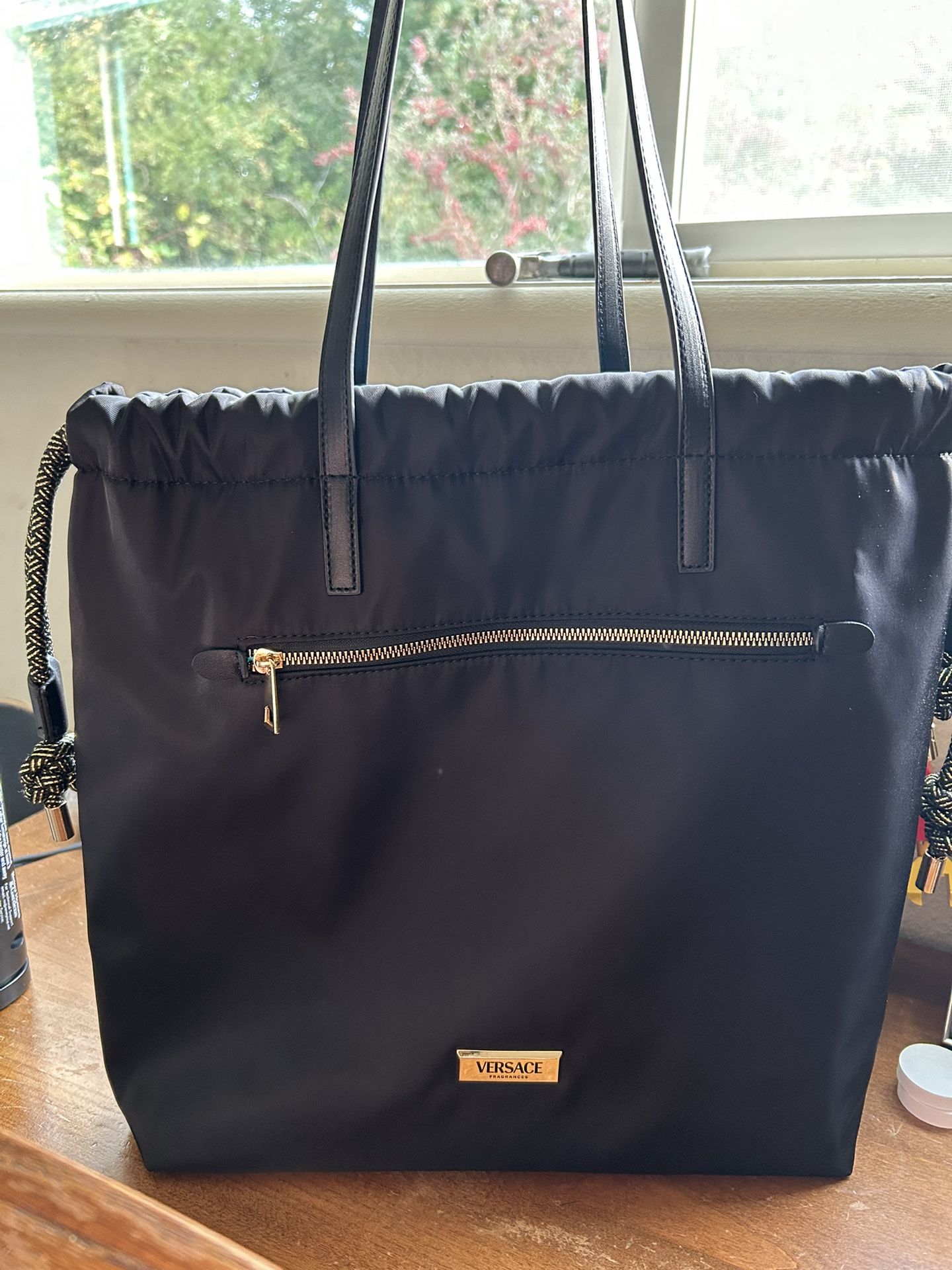 Versace fragrance canvas tote bag.