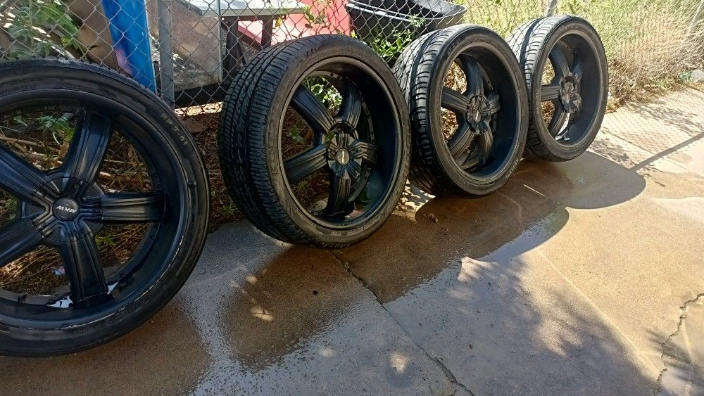 Mkw 24 in rims and tires the rims are interchangeable between Dodge and Ford CASH ONLY