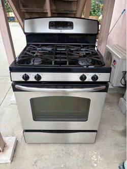 GE 4 burner oven stove