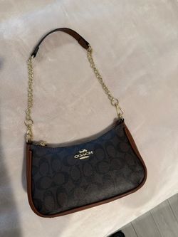 Cartera Coach
