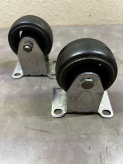 Brand new set of 2. 3 in. Black  Rubber and Steel Rigid Plate Caster with 175 lb Load Rating each