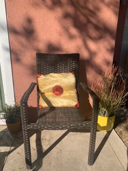 Two patio wicker chairs ( plastic)
