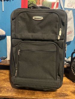 Proformance Black Rolling Carry-On Luggage
