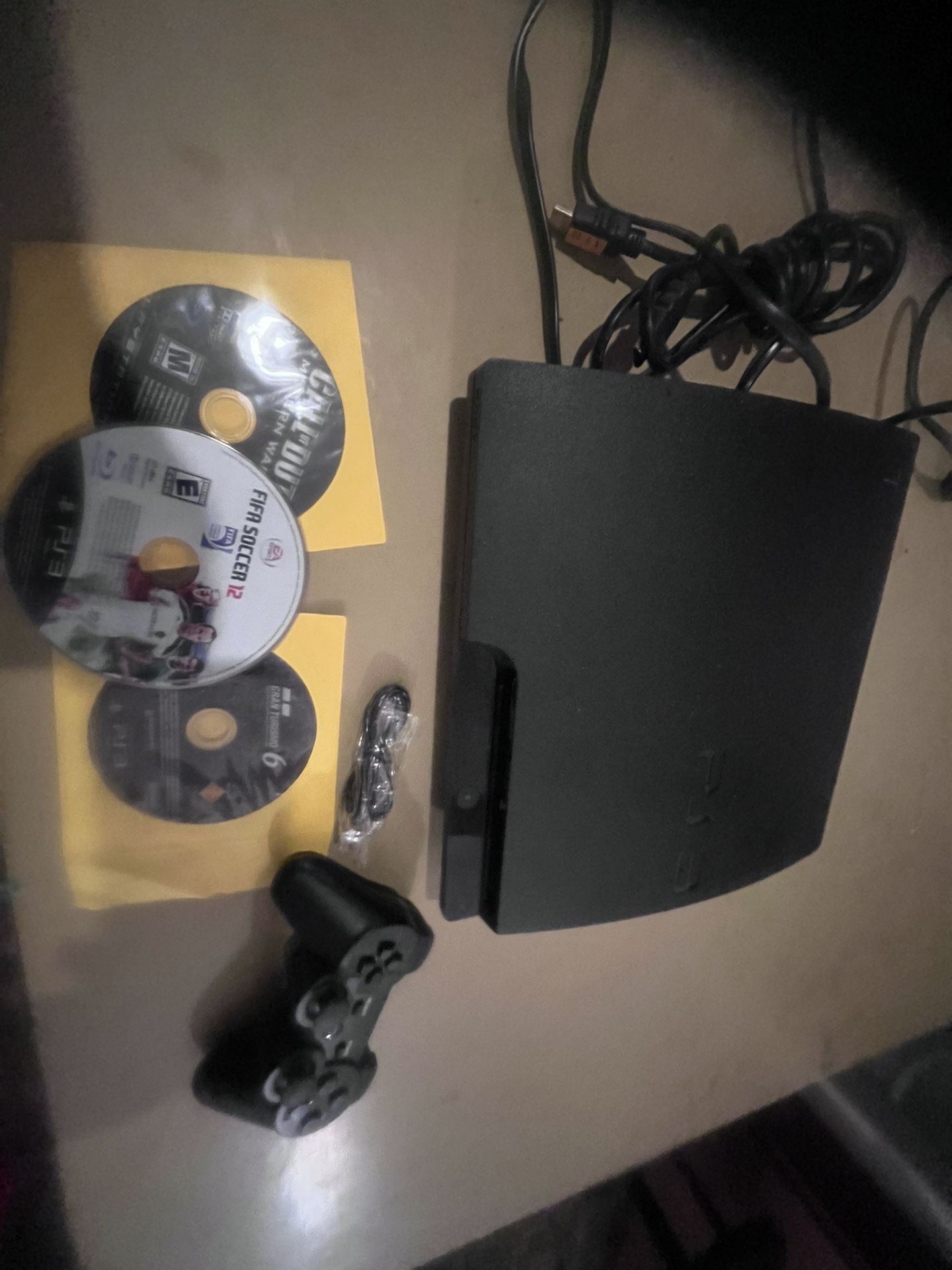 PS3 Slim 320 Gig W Game and One Control