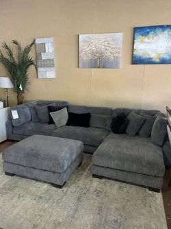 Gray modular sectional sofa chaise with ottoman