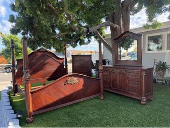 King-size bedroom set including mattress, 6-drawer dresser with mirror, and 5-drawer chest.