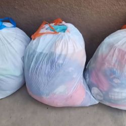 MIXED. CLOTHES $15 A BAG