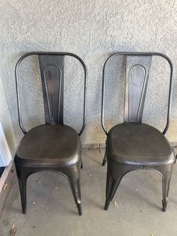 Set of 2 distressed metal indoor and outdoor dining chairs