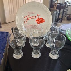 Fiesta chop plate and six fiesta goblets