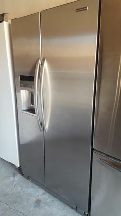 Refrigerator brand Kicheaid measures 36 wide and 70 high 3 months warranty delivery and installation