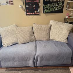 Blue pull-out Couch Can fit 3-4 ppl 