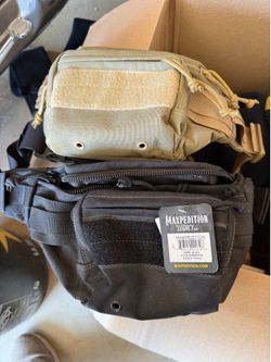 Two Fanny packs, 1 new 1 like new