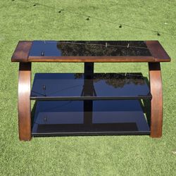 Modern Three-Tiered Tv Stand - Black Glass Shelves And Wood Frame
