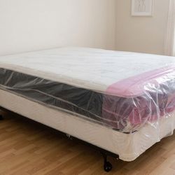 New queen mattress and box spring 2 pc bed frame is not included