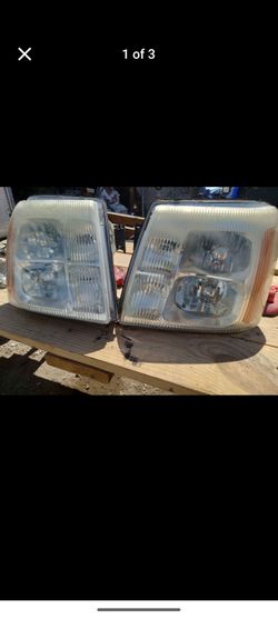 Factory HID headlights 03-06 Escalade