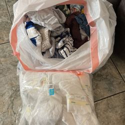 i have new born clothes only used ones and half a bag of new born diapers 