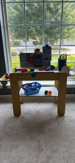 KidKraft Wooden Grocery Store Self-Checkout Center missing some Accessories. There is a bubble on belt but it still works. The plastic that held scann