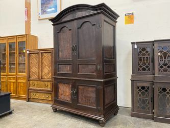 Large Vintage Dark Wood Arched Armoire with Curved Iron Handles